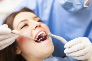 Woman receiving a dental treatment